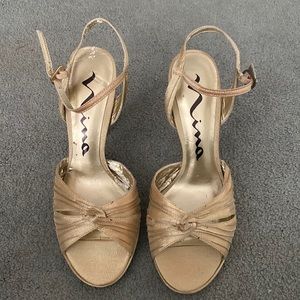 Nina Gold heels, been worn, pealing inside